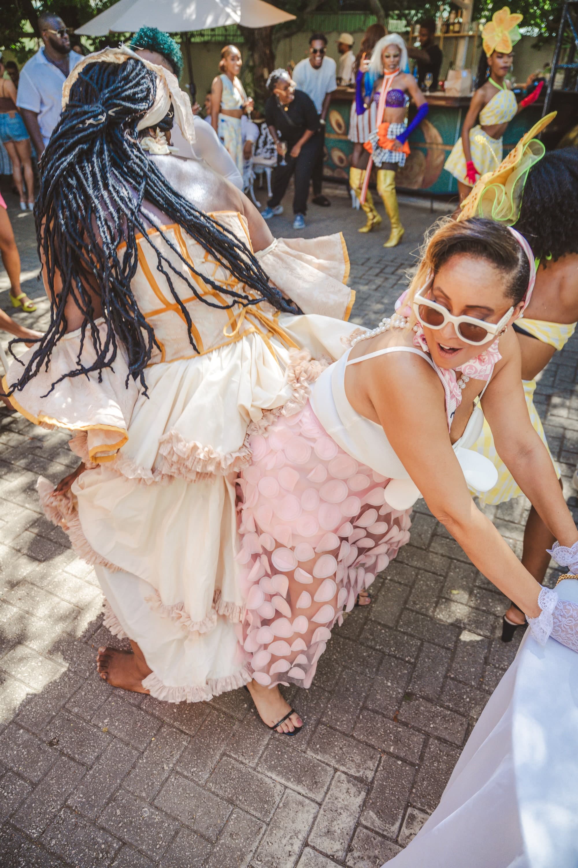 A VoBu guest in elaborate ruffled and sequined fashion, an example of Haute Pink taken somewhere unexpected.